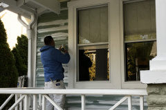 Working Near Windows During Painting Project in Alexandria, VA
