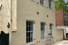 Working on Painting and Repairs on Exterior of Townhome in Alexandria, VA