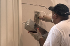 Repairing Part of Wall of Gallery in Old Town Alexandria